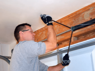 how to tighten garage door springs​
